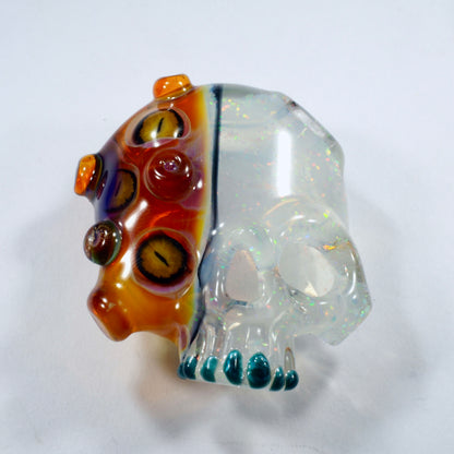 Two Faced Skulls by Warwick Glass - Purple Amber UV Snake Eyes Pendant